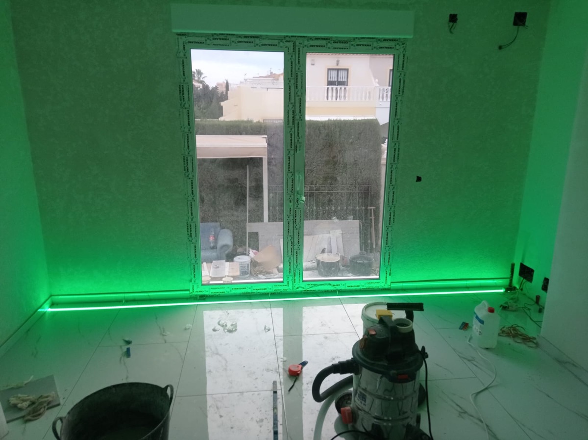Bedroom with RGB lighting — green mode