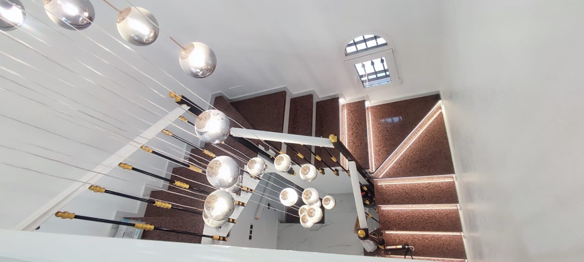 Cascading chandelier and LED staircase step lighting